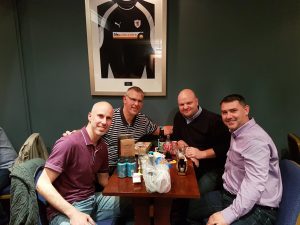 Four Men, One Cup, Seventy Points, and Seven Raffle Prizes